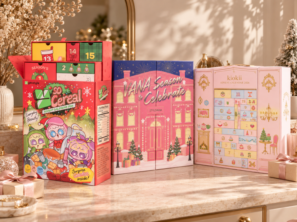 YesStyle Y So Cereal, Stylevana and Kiokii 2026 advent calendars standing on a marble vanity with holiday decor